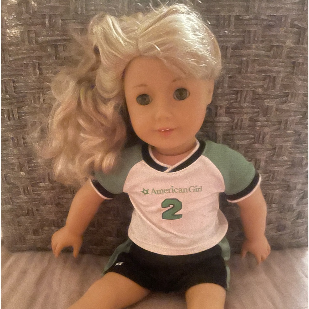 American girl doll, not sure her name but it was many of my daughter collection